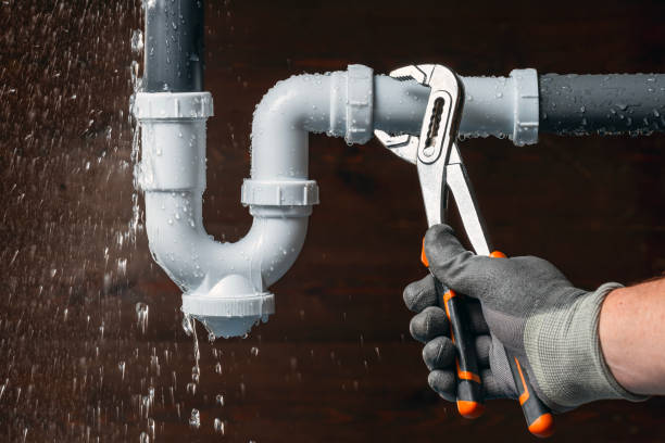 Professional Drain Cleaning technician working in Royal, IA